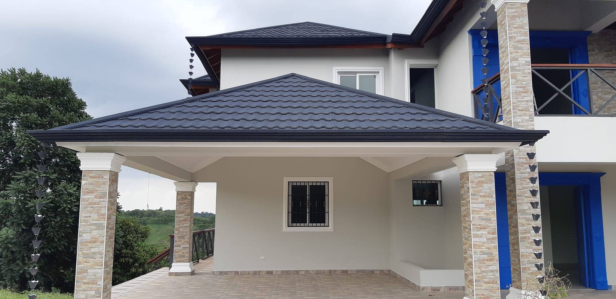 Nigerian Business Hotel Project Adopts Huitian's shingle Stone Coated Roof Tiles